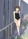  1girl absurdres against_fence ahoge black_one-piece_swimsuit blunt_bangs brown_eyes brown_hair casual_one-piece_swimsuit fence full_body grass highres kantai_collection kishinami_(kancolle) looking_at_viewer one-piece_swimsuit parted_lips sandals short_hair smile solo swimsuit toplow wavy_hair 