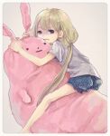  1girl blonde_hair brown_eyes comeco cushion futaba_anzu gloom_(expression) highres idolmaster idolmaster_cinderella_girls long_hair looking_at_viewer low_twintails parted_lips shirt shorts sitting solo stuffed_animal stuffed_rabbit stuffed_toy t-shirt twintails 