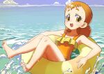  1girl afloat arisugawa_himari barefoot brown_eyes brown_hair casual_one-piece_swimsuit day double_bun ei_(eikun) flat_chest hair_bun kirakira_precure_a_la_mode looking_at_viewer ocean on_innertube one-piece_swimsuit open_mouth orange_one-piece_swimsuit outdoors precure smile solo swimsuit water wet 