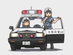  2girls blue_shirt car grey_background grey_hair helmet highres holding holding_microphone looking_to_the_side medium_hair microphone motor_vehicle multiple_girls ni_tsuma nissan nissan_cedric open_door open_mouth original police police_car shirt simple_background standing wire 