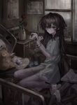  1girl absurdres ankle_cuffs bed black_hair blister_pack book bruise_on_neck bruise_on_wrist closed_mouth commentary cuffs dark electrical_outlet flower grey_eyes grey_sky handcuffs highres hospital hospital_bed hospital_gown indoors kneeling long_hair looking_at_viewer nightstand on_bed open_book original pill pill_bottle red_flower restraints senakira short_sleeves sky solo strangulation_mark stuffed_animal stuffed_toy stuffing teddy_bear vase window 