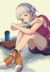  1girl arashi_chisato bag black_shorts blunt_bangs bottle brown_bag commentary_request hair_bun highres looking_at_viewer love_live! love_live!_superstar!! orange_shoes pink_shirt red_eyes shirt shoes shorts sitting solo sweat twintails water_bottle white_hair wristband yuuyu_(sun_yuu) 