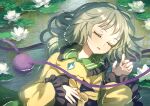  1girl black_hat bow buttons closed_eyes collared_shirt commentary_request diamond_button dise_(psychoro) flower frilled_shirt_collar frills green_hair green_nails hat hat_bow highres holding holding_unworn_clothes holding_unworn_hat komeiji_koishi lily_pad long_sleeves lying on_back shirt solo third_eye touhou unworn_hat unworn_headwear upper_body water water_lily_flower white_flower yellow_bow yellow_shirt 