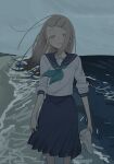  1girl beach black_sailor_collar black_skirt blonde_hair brown_eyes colored_eyelashes cowboy_shot gakuen_idolmaster hair_ornament hairclip highres holding holding_shoes holding_unworn_clothes idolmaster lllllklllli long_hair neckerchief ocean outdoors pleated_skirt sailor_collar school_uniform serafuku shinosawa_hiro shoes skirt sky sleeves_rolled_up smile solo unworn_shoes wind 