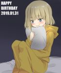  1girl bangs bed blonde_hair blue_eyes blush closed_mouth commentary_request dated english_text eyebrows_visible_through_hair fuji_(fuji_mount3333) girls_und_panzer happy_birthday holding hood hoodie katyusha long_sleeves night on_bed pajamas pants partial_commentary pillow pillow_hug shirt short_hair sitting smile solo yellow_pants yellow_shirt 