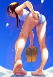  1girl adjusting_clothes adjusting_swimsuit ass barefoot blue_sky brown_eyes commentary_request day dripping feet from_behind from_below full_body highres holding_footwear leaning_forward long_hair original sandals school_swimsuit sky soles solo soon standing sunlight swimsuit water_drop white_swimsuit 