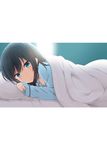  asashio_(kantai_collection) backlighting bangs bed_sheet black_hair blanket blue_eyes blush closed_mouth eyebrows_visible_through_hair glint highres jewelry kantai_collection letterboxed light_smile looking_at_viewer lying nagami_yuu non-web_source on_bed on_stomach pajamas pillow ring sidelocks smile solo under_covers 