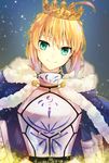  ahoge armor artoria_pendragon_(all) blonde_hair blue_background blue_cape cape closed_mouth crown fate/stay_night fate_(series) fur_trim green_eyes highres looking_at_viewer saber short_hair smile solo tomozero 