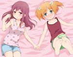  2girls barefoot bed blonde_hair blush couple embarrassed feet flower green_eyes hair_ornament hairclip hand_holding happy long_hair looking_at_another lying multiple_girls pigtails pink_eyes pink_hair sakura_trick shorts smile soles sonoda_yuu takayama_haruka tank_top toes yuri 