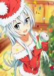  :d bangs bare_shoulders blue_eyes blue_hair blurry blurry_background christmas christmas_tree commentary confetti cowboy_shot depth_of_field elbow_gloves eyebrows_visible_through_hair foreshortening fur-trimmed_gloves fur_trim gloves hair_between_eyes hat hibiki_(kantai_collection) highres holding kantai_collection long_hair looking_at_viewer open_mouth party_popper perspective red_gloves red_vest santa_costume santa_hat smile solo standing tomato_(lsj44867) vest 