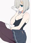  adjusting_clothes adjusting_gloves black_legwear blue_eyes breasts camisole cleavage dutch_angle gloves grey_background grey_hair hair_ornament hair_over_one_eye hairclip hamakaze_(kantai_collection) hand_on_own_thigh kantai_collection large_breasts mouth_hold open_fly pantyhose pleated_skirt short_hair simple_background sitting skirt sohin solo white_gloves 