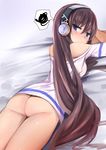  ass azur_lane bangs bed_sheet blue_eyes blush bottomless brown_hair closed_mouth commentary_request hair_between_eyes headphones highres jitome long_hair long_island_(azur_lane) looking_at_viewer looking_back lying muoto off-shoulder_shirt off_shoulder on_stomach shirt solo speech_bubble spoken_squiggle squiggle thighs very_long_hair white_shirt 