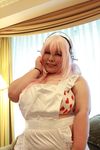  1girl breasts cosplay fat female huge_breasts luu_(cosplayer) nitroplus photo pink_hair solo super_sonico super_sonico_(cosplay) 