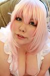  1girl breasts cosplay fat female huge_breasts luu_(cosplayer) nitroplus photo pink_hair solo super_sonico super_sonico_(cosplay) 