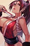  breasts brown_eyes brown_hair cleavage fan fatal_fury folding_fan hair_between_eyes hand_up hankuri holding large_breasts lips lipstick long_hair looking_at_viewer makeup obi parted_lips ponytail revealing_clothes sash shiranui_mai sleeveless snk solo the_king_of_fighters upper_body 
