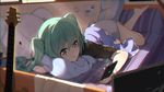  bangs barefoot blanket chromatic_aberration earbuds earphones electric_guitar green_eyes green_hair guitar hatsune_miku highres indoors instrument long_hair lying monitor mouth_hold pillow solo twintails vocaloid wallpaper zhayin-san 