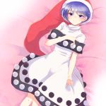 1girl aoi_(annbi) blue_hair commentary doremy_sweet dress hat highres lying nightcap on_back pom_pom_(clothes) purple_eyes red_hat solo touhou white_dress 