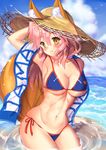  animal_ears bikini blue_bikini blush breasts cleavage closed_mouth commentary_request cowboy_shot day ears_through_headwear fate/grand_order fate_(series) fox_ears fox_tail hair_between_eyes hat highres large_breasts long_hair looking_at_viewer mogupuchi navel ocean pink_hair smile solo stomach straw_hat sun_hat swimsuit tail tamamo_(fate)_(all) tamamo_no_mae_(swimsuit_lancer)_(fate) wading yellow_eyes 
