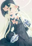  abigail_williams_(fate/grand_order) bangs black_bow black_dress black_hat black_joa blonde_hair blue_eyes bow brown_background covered_mouth dress fate/grand_order fate_(series) gradient gradient_background grey_background hair_bow hat highres long_hair long_sleeves looking_at_viewer orange_bow parted_bangs sleeves_past_wrists solo very_long_hair 