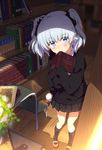  ahoge bangs black_legwear black_skirt blue_eyes blurry blush book bookshelf commentary_request depth_of_field holding holding_book indoors long_sleeves looking_at_viewer mary_janes ogipote open_book original shoes silver_hair skirt sleeves_past_wrists socks solo sunlight twintails 