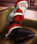  alternate_costume belt black_legwear blush closed_mouth coat commentary_request couch fire fireplace hair_between_eyes hat highres jacket kantai_collection long_hair looking_at_viewer pantyhose red_coat red_hat santa_costume santa_hat shoukaku_(kantai_collection) silver_hair sitting solo tama_(seiga46239239) yellow_eyes 