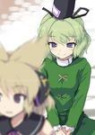  bangs blonde_hair blue_eyes blurry blush closed_mouth commentary_request depth_of_field dress earmuffs ebizome eyebrows_visible_through_hair green_dress green_hair hat long_sleeves multiple_girls own_hands_together pointy_hair short_hair smile soga_no_tojiko tate_eboshi touhou toyosatomimi_no_miko 