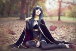  1girl anissa belt black_hair bodystocking bra cosplay fire_emblem hair_ornament high_heels long_hair outdoor photo sitting solo tharja 