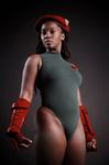  1girl cammy_white capcom cosplay dark_skin leotard looking_at_viewer military military_uniform non-asian street_fighter thighs 