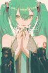  1girl :d absurdres bare_shoulders black_sleeves collared_shirt detached_sleeves green_eyes green_hair green_nails green_necktie grey_shirt hair_between_eyes hair_ornament hands_up hatsune_miku highres long_hair looking_at_viewer necktie number_tattoo oji-sama_(ochi4t) shirt shoulder_tattoo sleeveless sleeveless_shirt smile solo tattoo twintails twitter_username upper_body vocaloid yellow_background 