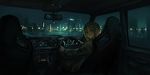  blonde_hair car_interior city city_lights closed_mouth jacket lm7_(op-center) long_sleeves looking_at_viewer looking_back night night_sky original right-hand_drive short_hair sky skyline solo steering_wheel yellow_eyes 
