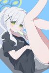  1girl absurdres ass black_halo black_shirt blue_archive blue_background blush collarbone commentary_request feet_out_of_frame food from_side frown green_eyes green_halo grey_hair grey_shorts hair_between_eyes hair_intakes hair_ornament halo hare_(blue_archive) highres holding holding_food holding_popsicle legs_up long_hair long_sidelocks looking_at_viewer mochigome_(ununquadium) off-shoulder_shirt off_shoulder ponytail popsicle print_shirt shadow shirt short_shorts shorts sidelocks simple_background sitting solo sweat t-shirt thighs x_hair_ornament 