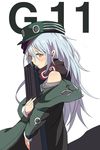  assault_rifle bangs bare_shoulders beret blush brown_eyes bullpup character_name closed_mouth coat collared_coat commentary_request eyebrows_visible_through_hair eyes_visible_through_hair from_side g11 g11_(girls_frontline) girls_frontline green_coat grey_shirt gun hair_between_eyes hat heckler_&amp;_koch highres holding holding_gun holding_weapon jacket long_hair long_sleeves looking_at_viewer magazine_(weapon) off_shoulder open_clothes open_coat rifle scarf scarf_on_head shirt silver_hair simple_background solo tareme ururu very_long_hair weapon white_background 