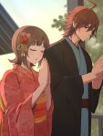 1boy 1girl ahoge amagase_touma amami_haruka brown_hair closed_eyes commentary_request day floral_print highres idolmaster idolmaster_(classic) idolmaster_side-m japanese_clothes kimono looking_at_another obi one_eye_closed outdoors palms_together pinnmoku praying red_eyes red_kimono sash short_hair side-by-side sideways_glance standing 