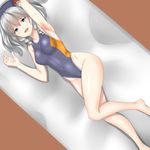  30-06 barefoot beret breasts competition_swimsuit full_body green_eyes grey_swimsuit hat kantai_collection kashima_(kantai_collection) looking_at_viewer lying medium_breasts on_side one-piece_swimsuit open_mouth silver_hair solo swimsuit twintails wavy_hair 