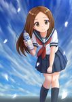  blue_skirt blue_sky bottle brown_eyes brown_hair cloud commentary day highres holding holding_bottle karakai_jouzu_no_takagi-san kazenokaze kneehighs long_hair looking_at_viewer navy_blue_legwear petals pleated_skirt school_uniform serafuku skirt sky smile solo takagi-san water_bottle 