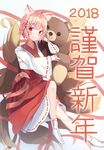  2018 animal_ears bangs blush closed_mouth commentary_request eyebrows_visible_through_hair fox_ears fox_girl fox_tail hakama happy_new_year highres japanese_clothes kimono kyuubi long_sleeves looking_at_viewer multiple_tails nengajou new_year no_shoes object_hug original pink_hair red_eyes red_hakama ribbon-trimmed_sleeves ribbon_trim seero short_hair sitting slit_pupils smile solo stuffed_animal stuffed_toy tabi tail teddy_bear whisker_markings white_kimono white_legwear wide_sleeves 