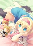  alice_margatroid barefoot blonde_hair blue_eyes capelet character_doll doll feet hairband highres kirisame_marisa long_hair shanghai_doll short_hair sock_pull solo thighhighs tokira_nozumi touhou 