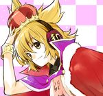  arm_up bangs blonde_hair cape checkered checkered_background closed_mouth crown earmuffs eyebrows_visible_through_hair hair_between_eyes hand_on_headwear makuwauri pointy_hair red_cape short_hair solo sparkle touhou toyosatomimi_no_miko upper_body yellow_eyes 