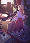  blonde_hair book brown_eyes chair day digital_media_player flower highres indoors kagawa_yuusaku kneeling long_hair long_skirt looking_at_viewer looking_back original skirt solo table vase 