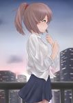  blue_skirt brown_hair building cityscape cowboy_shot expressionless gradient_sky green_eyes highres long_sleeves looking_to_the_side original outdoors ponytail profile railing shirt short_hair skirt sky skyscraper solo sotiark sunset twilight untucked_shirt white_shirt wind 