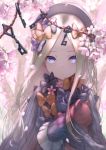  abigail_williams_(fate/grand_order) bangs black_bow black_dress black_hat blonde_hair blue_eyes blurry blurry_foreground bow branch commentary_request depth_of_field dress fate/grand_order fate_(series) flower forehead hair_bow hat highres kachayori key long_hair long_sleeves looking_at_viewer object_hug orange_bow parted_bangs parted_lips pink_flower polka_dot polka_dot_bow sleeves_past_fingers sleeves_past_wrists solo stuffed_animal stuffed_toy teddy_bear very_long_hair 