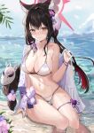  1girl absurdres animal_ears beach bikini black_hair blue_archive breasts commentary day flower fox_ears hair_flower hair_ornament halo harune_rane highres linea_alba long_hair looking_at_viewer mask multicolored_hair navel partially_submerged red_hair sitting smile solo swimsuit thigh_strap twintails two-tone_hair wakamo_(blue_archive) wakamo_(swimsuit)_(blue_archive) water white_bikini yellow_eyes 