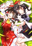  2girls arm_up armpits ascot black_bow black_bowtie black_hair black_skirt blush bow bowtie brown_eyes brown_hair commentary_request commission detached_sleeves dress feet_out_of_frame fuji_tarawi grin hair_bow hair_tubes hakurei_reimu highres holding_hands long_hair looking_at_viewer lying multiple_girls on_back on_grass one_eye_closed open_mouth pointy_ears puffy_short_sleeves puffy_sleeves red_bow red_dress red_eyes red_headwear ribbon-trimmed_sleeves ribbon_trim shameimaru_aya shirt short_sleeves skeb_commission skirt smile socks touhou white_shirt white_socks wide_sleeves yellow_ascot 