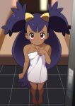  1girl barefoot blurry blurry_background blush brown_eyes closed_mouth collarbone commentary_request dark-skinned_female dark_skin eyelashes full_body hand_up highres iris_(pokemon) kohatsuka long_hair looking_at_viewer low-tied_long_hair naked_towel pokemon pokemon_bw raised_eyebrows smile solo standing tile_floor tiles towel two_side_up 