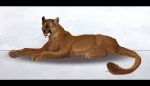  black_bars brown_fur cougar feline feral fur green_eyes linhagen lying mammal paws simple_background solo 