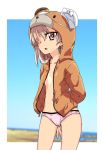  animal_costume arms_behind_back bandages bangs bear_costume bikini_bottom bikini_tan blurry blurry_background boko_(girls_und_panzer) brown_shirt commentary cowboy_shot crotch_seam day depth_of_field eyepatch girls_und_panzer hair_over_one_eye hood hoodie light_brown_eyes light_brown_hair long_hair looking_at_viewer monolith_(suibou_souko) navel open_clothes open_mouth open_shirt outdoors outside_border pink_bikini_bottom shimada_arisu shirt sky solo standing tan tanline 