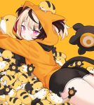  1girl animal_hood ass black_shorts blonde_hair brown_hair cat_hood commentary dolphin_shorts english_commentary gigi_murin gigi_murin_(1st_costume) grem_(gigi_murin) hair_through_hood highres hitsukuya hololive hololive_english hood hood_up hoodie long_hair long_sleeves looking_at_viewer lying multicolored_hair o3o on_stomach orange_background orange_hoodie pink_eyes puckered_lips short_hair short_shorts short_twintails shorts solo tail twintails two-tone_hair virtual_youtuber 