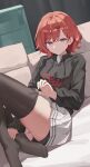  1girl absurdres adjusting_clothes adjusting_legwear black_sweater black_thighhighs collared_shirt commentary_request dddm drawstring hair_ornament hairclip highres higuchi_madoka idolmaster idolmaster_shiny_colors indoors long_sleeves looking_at_viewer medium_hair miniskirt mole mole_under_eye parallel_hairclips parted_bangs parted_lips pleated_skirt print_sweater purple_eyes reclining red_hair shirt shorts shorts_under_skirt sidelocks skirt solo sweater thighhighs white_shirt white_skirt 
