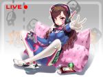  animal_print bodysuit breasts brown_eyes brown_hair bunny_print can chips commentary controller d.va_(overwatch) dualshock facial_mark food game_controller gamepad gloves headphones long_hair looking_at_viewer medium_breasts mouth_hold overwatch pillow pink_pillow print_pillow sitting solo v white_gloves winddale 
