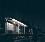  black_hair blurry commentary dark lights long_hair night original power_lines railroad_tracks scenery school_uniform serafuku sketch sky snatti train_station train_station_platform vanishing_point 